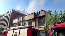 نجات ۱۸ نفر از افراد محبوس شده میان دود غلیظ + تصاویر